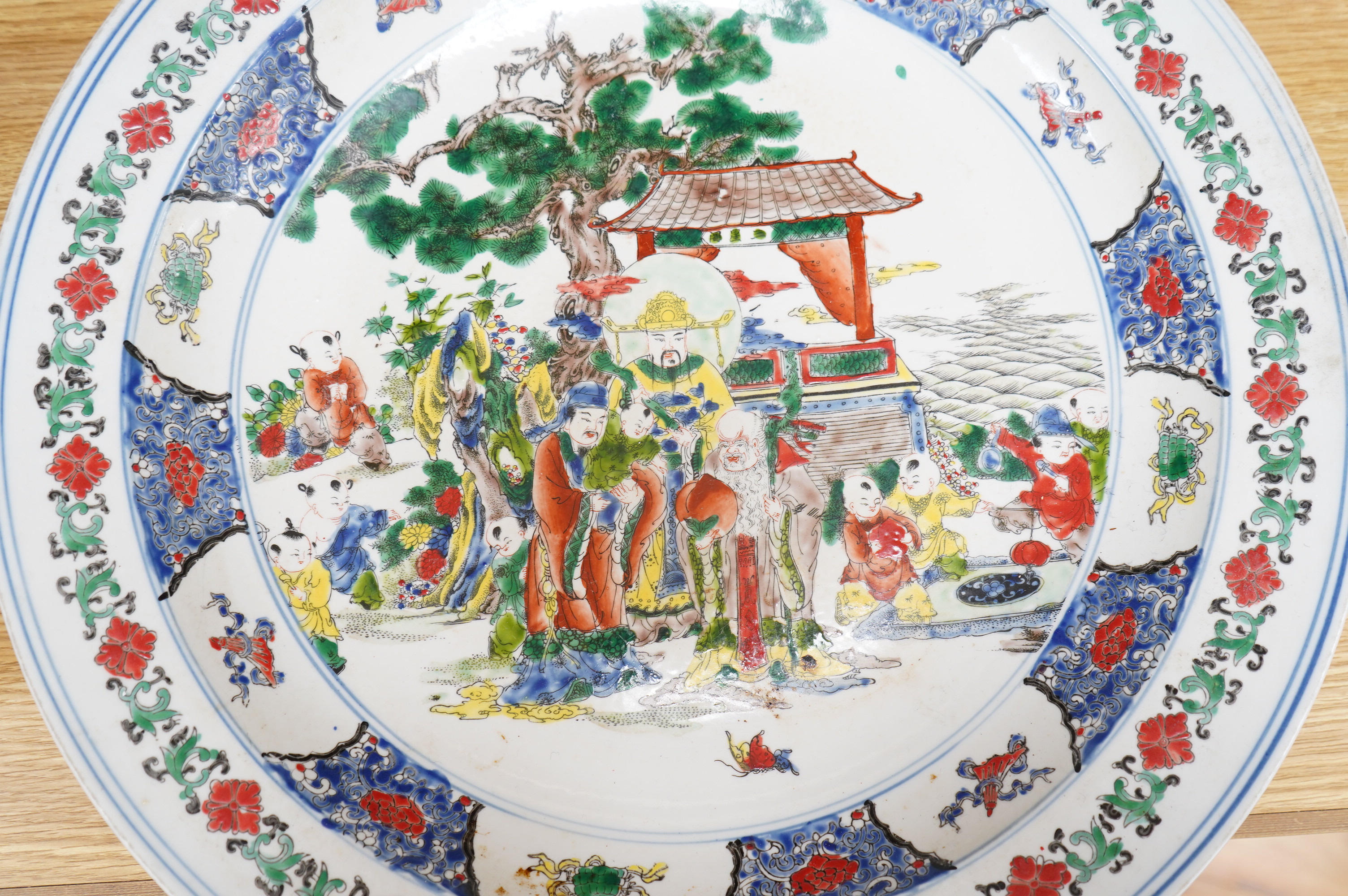 A Chinese famille verte charger with later Kangxi mark, 45.5cm diameter. Condition - fair